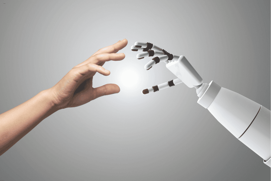 Mão humana prestes a tocar uma mão robótica, simbolizando conexão emocional entre humanos e IA.